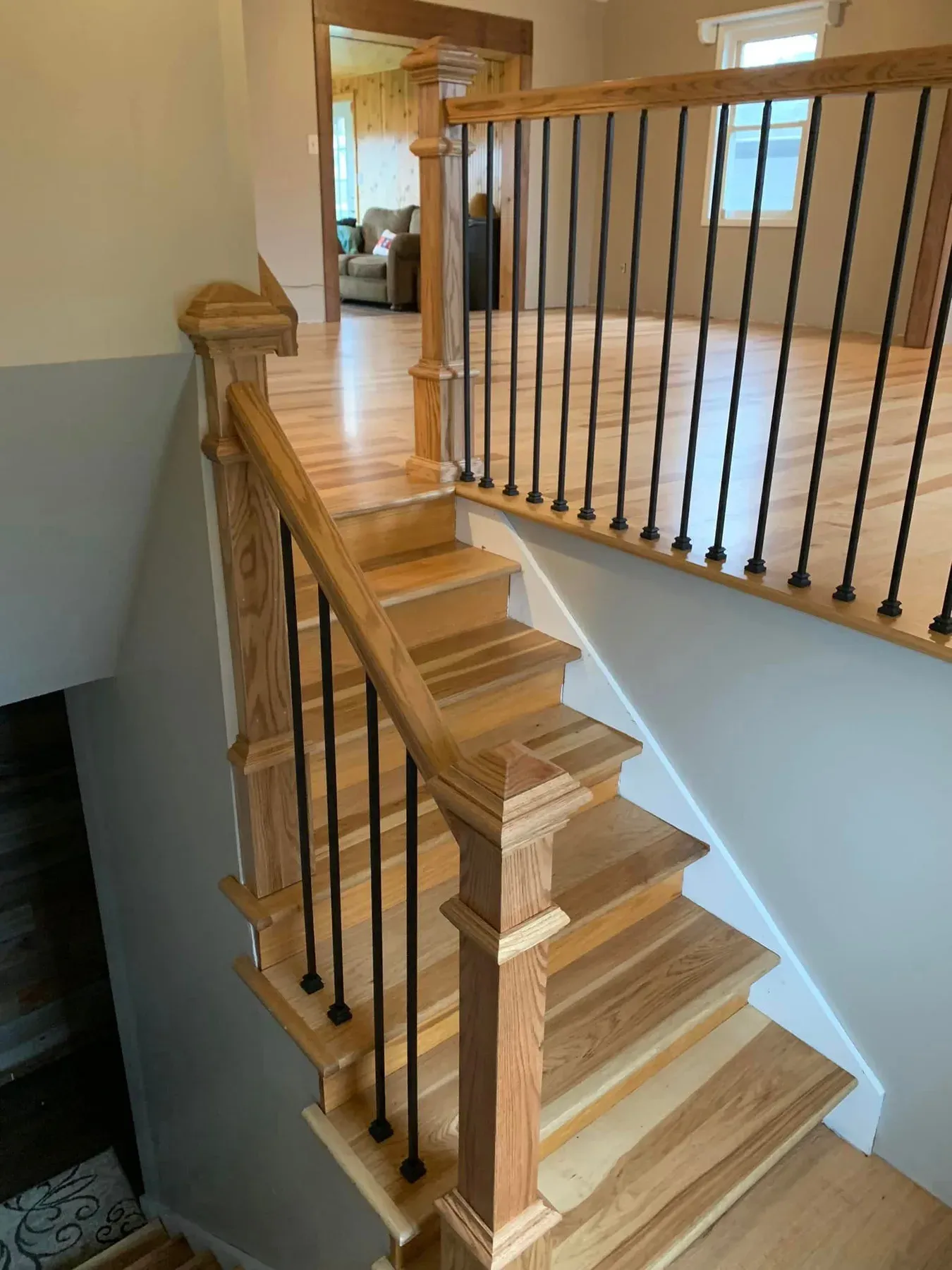 Newly installed red oak stair treads in a Kansas City home